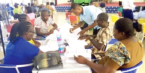 Mr Richard Parnor (arrowed) of Odumase Akro Junior High School, leading his group to perform an assignment